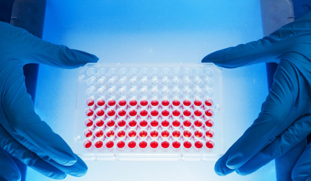 About Us, Mission: pipette test tubes filled with red solution